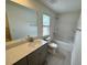 Bathroom with a double vanity and a shower-tub combination at 10523 Brookside Reserve Rd, Raleigh, NC 27614