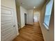 Inviting entryway featuring hardwood flooring and access to the main living areas at 10523 Brookside Reserve Rd, Raleigh, NC 27614