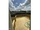 New wooden deck overlooking a fenced backyard and lush greenery at 106 Bishop Ln, Dunn, NC 28334