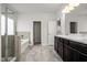 This bathroom has a walk-in shower, soaking tub, and double sink vanity at 106 E Victory View. Ter, Smithfield, NC 27577