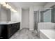 Contemporary bathroom featuring a walk-in shower and double vanity at 106 E Victory View. Ter, Smithfield, NC 27577
