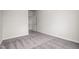 Neutral bedroom with plush carpeting and view to walk-in closet at 106 E Victory View. Ter, Smithfield, NC 27577