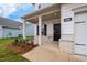 Charming front porch with brick accents and a well-manicured lawn and address number visible at 106 E Victory View. Ter, Smithfield, NC 27577