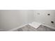 Laundry room with tile flooring and utility connections at 106 E Victory View. Ter, Smithfield, NC 27577
