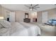 Bedroom featuring carpet flooring, neutral walls, and a view of a wet bar at 1079 Vauxhall Dr, Apex, NC 27502