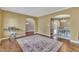 Open-concept room showcasing hardwood floors and arched doorways at 1079 Vauxhall Dr, Apex, NC 27502