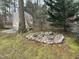 Landscaping with a covered area and rock garden at 117 Lone Star Dr, Louisburg, NC 27549