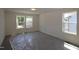 Well-lit bedroom with three windows providing natural light at 1229 Dimaggio Dr # 8, Raleigh, NC 27616