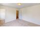 Bright bedroom features neutral carpeting and paint with a door leading to a closet at 1229 Dimaggio Dr # 8, Raleigh, NC 27616