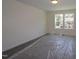 Neutral bedroom with two windows, providing natural light at 1229 Dimaggio Dr # 8, Raleigh, NC 27616