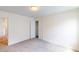 Bright bedroom features neutral carpeting, a door to a walk-in closet and an ensuite bathroom at 1229 Dimaggio Dr # 8, Raleigh, NC 27616