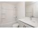 Bathroom features single vanity with quartz counters and shower and bathtub combo at 1250 Barreto Dr, Wendell, NC 27591