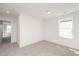 Neutral carpeted bedroom features natural light from the single window at 1250 Barreto Dr, Wendell, NC 27591