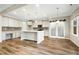 Well-equipped kitchen offers ample storage, a large island, and modern finishes at 130 Neuse Overlook Dr, Clayton, NC 27527