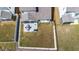 Backyard aerial view showing a patio and fenced-in yard at 1311 Arena Ln, Fuquay Varina, NC 27526