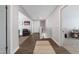 Upstairs hallway features hardwood floors and leads to the bedrooms and other living spaces at 1311 Arena Ln, Fuquay Varina, NC 27526