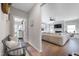 Hallway view into living room with fireplace and comfortable sofa at 1311 Arena Ln, Fuquay Varina, NC 27526