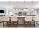 Spacious kitchen featuring a center island with seating, stainless steel appliances, and an open layout at 1311 Arena Ln, Fuquay Varina, NC 27526