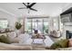 Elegant living room with sliding glass doors to a screened porch and comfortable seating at 1311 Arena Ln, Fuquay Varina, NC 27526