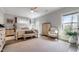Calming main bedroom with bright windows and a comfortable bed with a cushioned bench at 1311 Arena Ln, Fuquay Varina, NC 27526