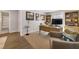 Home office features a wooden desk, built-in shelving, and comfortable seating at 1311 Arena Ln, Fuquay Varina, NC 27526