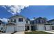 Inviting townhomes feature attached garages, neutral paint, and well-manicured lawns at 144 Parker Ln, Mebane, NC 27302