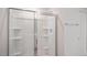 Bathroom highlighting a modern glass-enclosed shower and white walls at 156 Paper Birch Way, Fuquay Varina, NC 27526