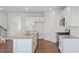 Bright kitchen featuring stainless steel appliances, granite countertops, and ample cabinet space at 156 Paper Birch Way, Fuquay Varina, NC 27526