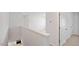 Upstairs hallway with neutral walls and carpeted floors, leading to bedrooms at 156 Paper Birch Way, Fuquay Varina, NC 27526