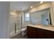 Bright bathroom with a shower, and double vanity, modern fixtures at 160 Parker Ln, Mebane, NC 27302