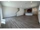 Open-concept living space featuring hardwood floors, recessed lighting, and a staircase at 160 Parker Ln, Mebane, NC 27302
