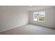 Bedroom with neutral carpet, natural light from a window, and neutral walls at 168 Paper Birch Way, Fuquay Varina, NC 27526