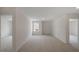 Spacious carpeted bedroom with natural light from a window and neutral walls at 168 Paper Birch Way, Fuquay Varina, NC 27526