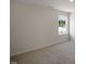 Bedroom featuring neutral carpet, a window, and neutral walls at 168 Paper Birch Way, Fuquay Varina, NC 27526
