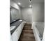 Bathroom boasts double sinks with granite countertops and a soaking tub at 175 Magnolia Run Way, Benson, NC 27504