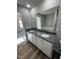 Bathroom vanity features double sinks with granite countertops at 175 Magnolia Run Way, Benson, NC 27504