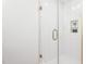 Modern shower featuring white subway tile, glass door, and gold hardware accents at 206 Ellington Rd, Graham, NC 27253