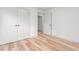 Bedroom with light-colored floors and modern white closet doors at 206 Ellington Rd, Graham, NC 27253