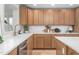 Bright and airy kitchen with modern light-wood cabinetry, quartz countertops, and stainless steel appliances at 206 Ellington Rd, Graham, NC 27253