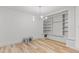 Bright living room featuring a modern light fixture and white trim at 206 Ellington Rd, Graham, NC 27253