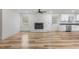 Bright living room featuring a fireplace and an open floor plan at 206 Ellington Rd, Graham, NC 27253