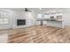 Bright living room featuring a fireplace and an open floor plan at 206 Ellington Rd, Graham, NC 27253
