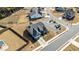 An aerial view of a home showcasing its landscaping, driveway, and proximity to neighborhood streets at 25 Bourne Dr, Franklinton, NC 27525