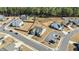An aerial view of a charming home featuring a well-kept lawn and a backyard with wooden fencing at 25 Bourne Dr, Franklinton, NC 27525