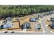 An aerial view of a modern two-story home with a manicured front yard and ample backyard space at 25 Bourne Dr, Franklinton, NC 27525
