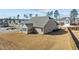 Expansive backyard with a well-manicured lawn and a charming exterior view of the home at 25 Bourne Dr, Franklinton, NC 27525