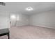 Large, well-lit bonus room with fresh paint and neutral carpeting at 25 Bourne Dr, Franklinton, NC 27525