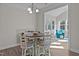 Cozy breakfast nook with a round table, four chairs, and lots of natural light at 25 Bourne Dr, Franklinton, NC 27525