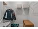 Walk-in closet with ample storage space and organization system for clothing and accessories at 25 Bourne Dr, Franklinton, NC 27525
