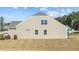 Exterior side view of home shows ample yard space, siding, and windows at 25 Bourne Dr, Franklinton, NC 27525